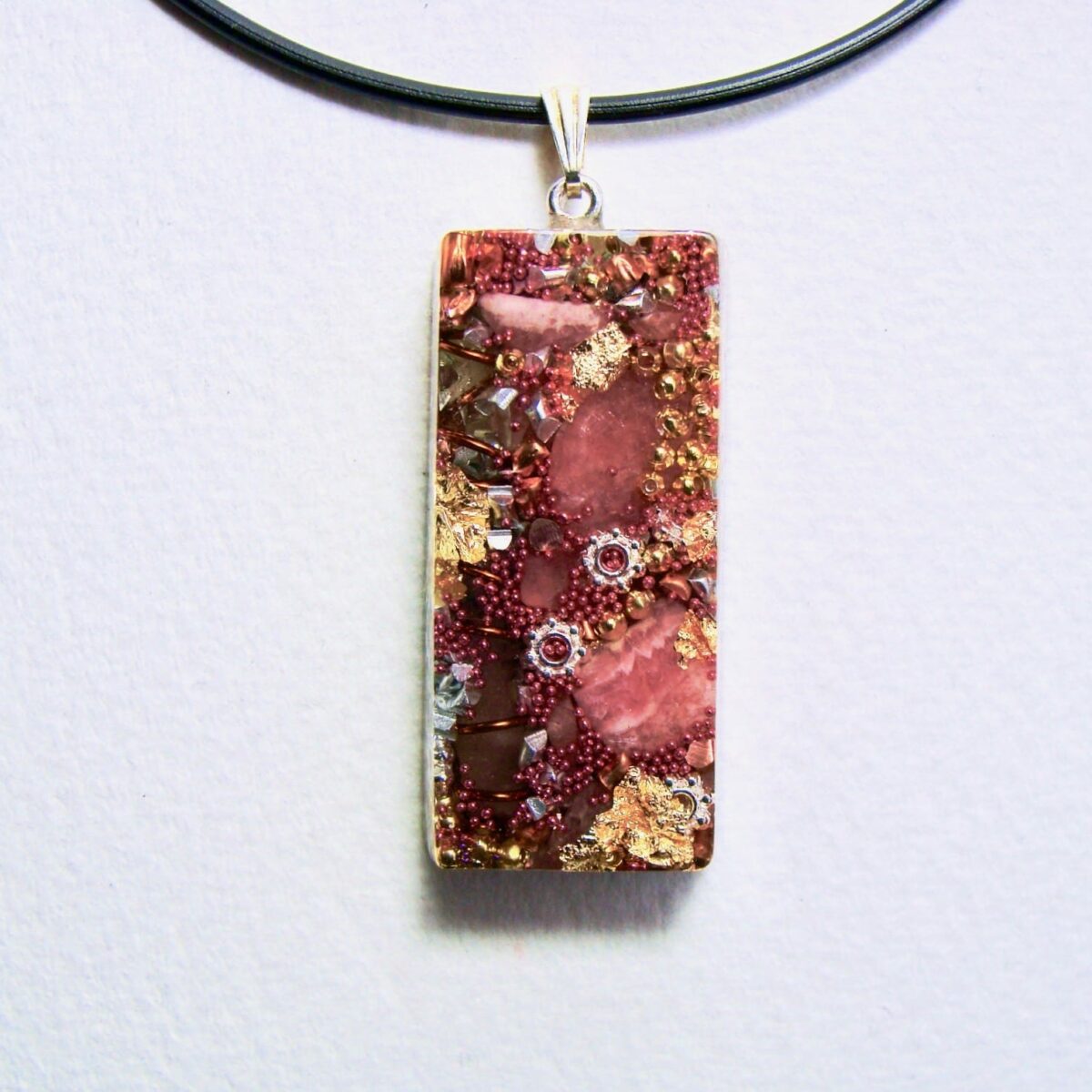 Pendentif orgonite rectangle rhodocrosite